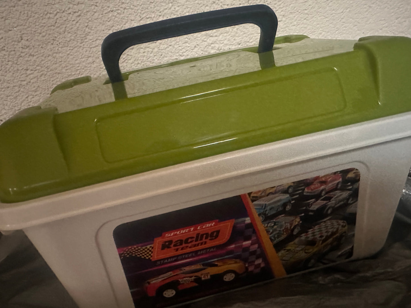 Pull back metal cars in a box